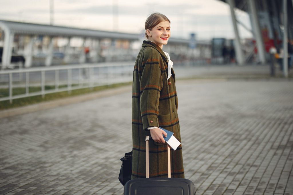 This woman traveling overseas may need to familiarize herself with the basics of investing abroad, many of which are discussed in this article.